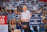 Canadian prime minister Stephen Harper looks on during a rally in Ontario