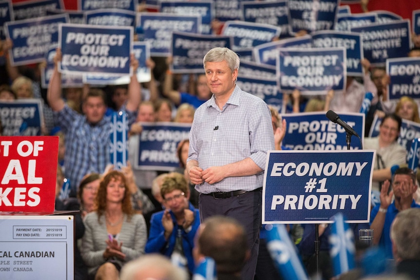 Canadian prime minister Stephen Harper looks on during a rally in Ontario