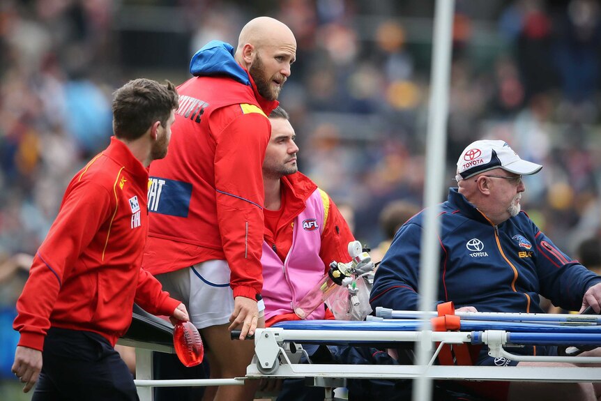 Gary Ablett is stretchered off Adelaide Oval