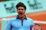 Roger Federer screams in delight