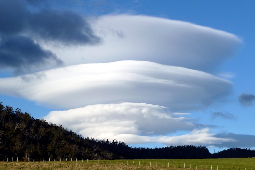 A lenticular cloud forms over Lachlan in Tasmania.