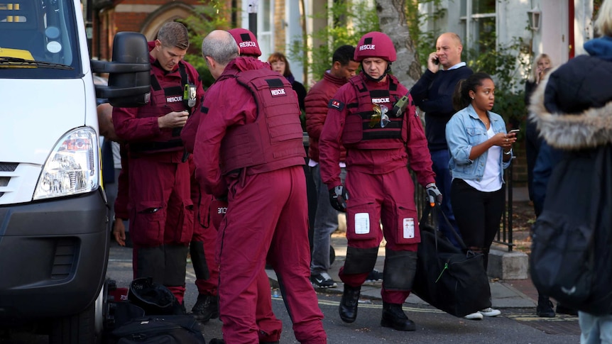 Members of bomb disposal squad near Parsons Green