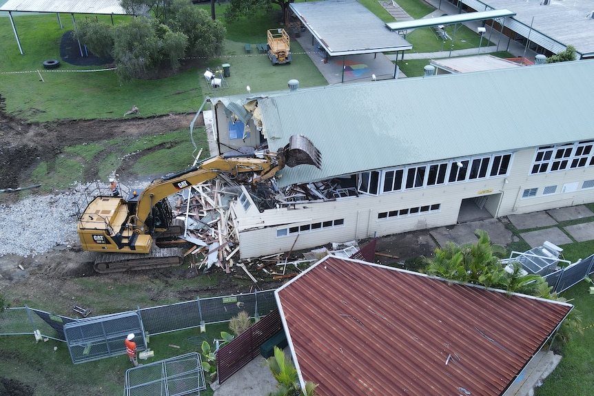 Rocklea State School building being demolished after being damaged by flood in February 2022.