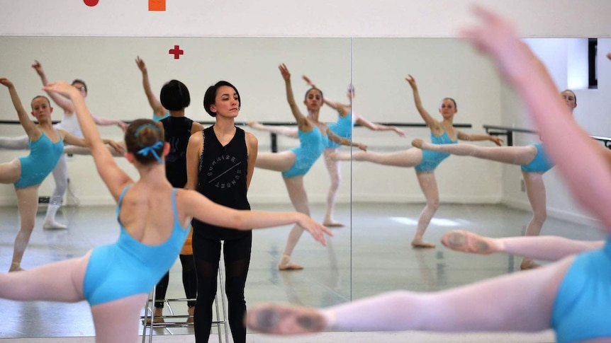 Ballet teacher Claire Hill watching children in their ballet class in Perth.