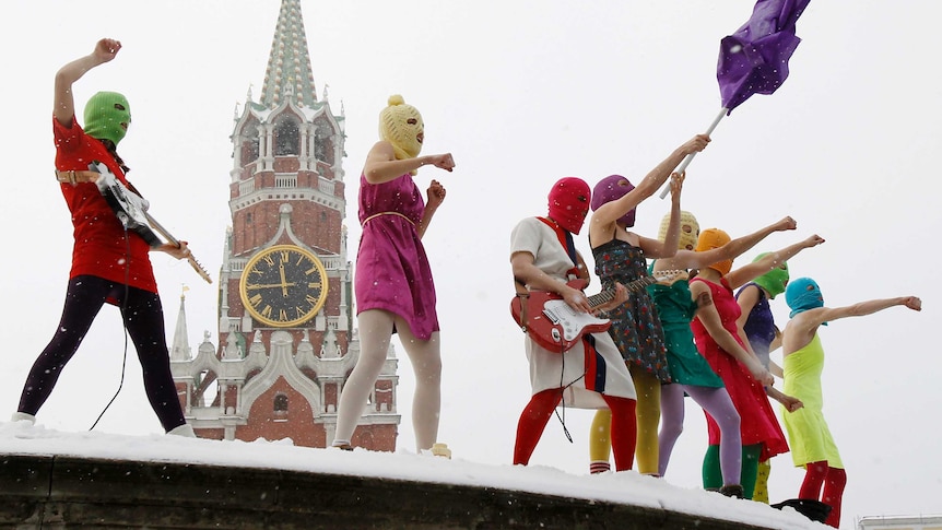 Members of the Russian radical feminist group 'Pussy Riot' sing in the Red Square