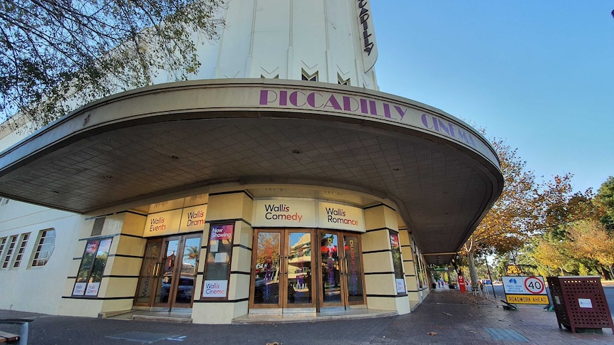 The front glass door entrance to the Piccadilly Cinema in North Adelaide