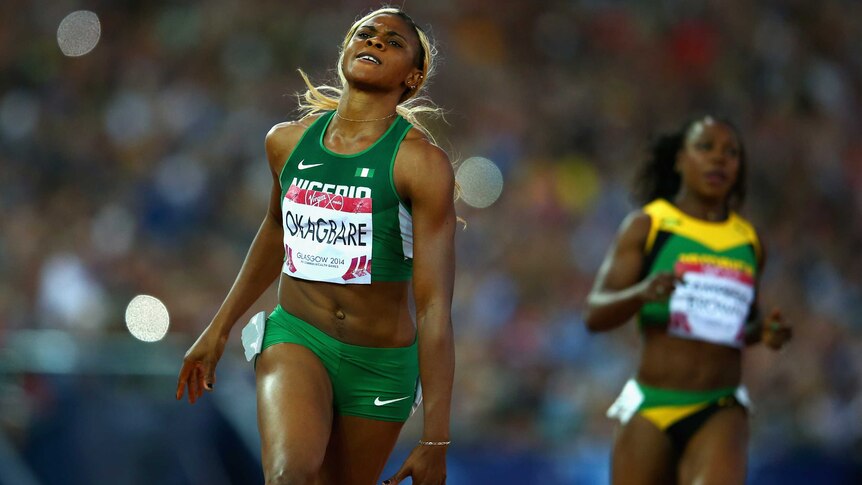 Nigeria's Blessing Okagbare wins the women's 100m ahead of Jamaica's Veronica Campbell-Brown