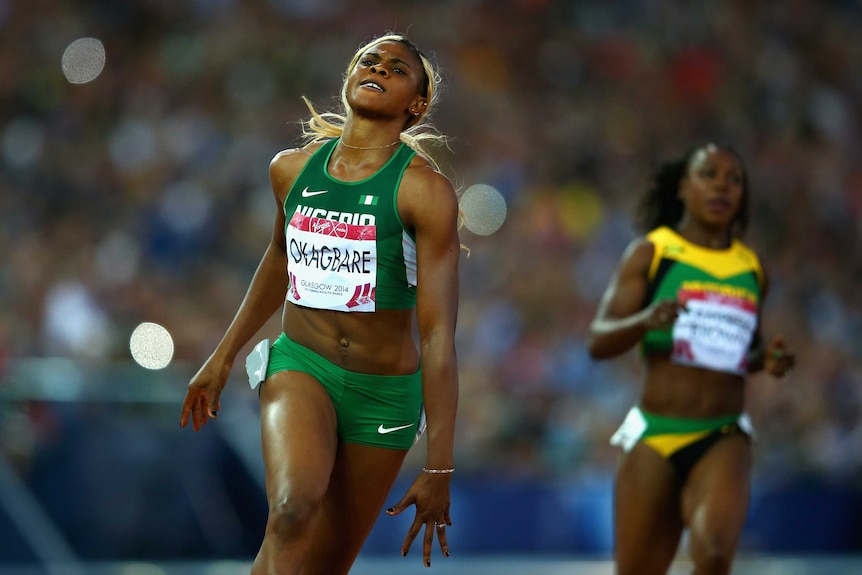 Nigeria's Blessing Okagbare wins the women's 100m ahead of Jamaica's Veronica Campbell-Brown