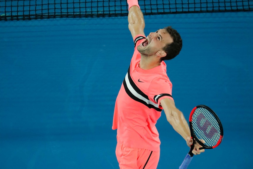 Grigor Dimitrov roars with delight after beating Nick Kyrgios at the Australian Open