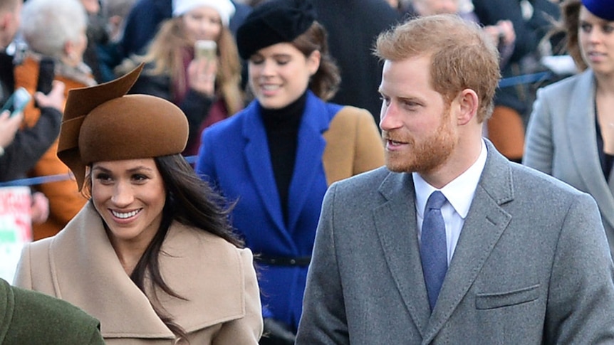 Prince Philip, Prince Harry and Meghan Markle arrive for the Royal Family's Christmas Day service.