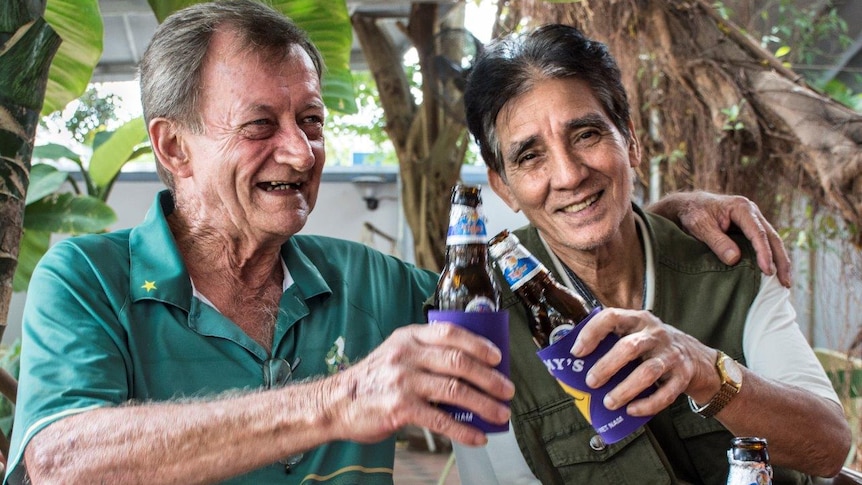 Rod and Thu share a beer