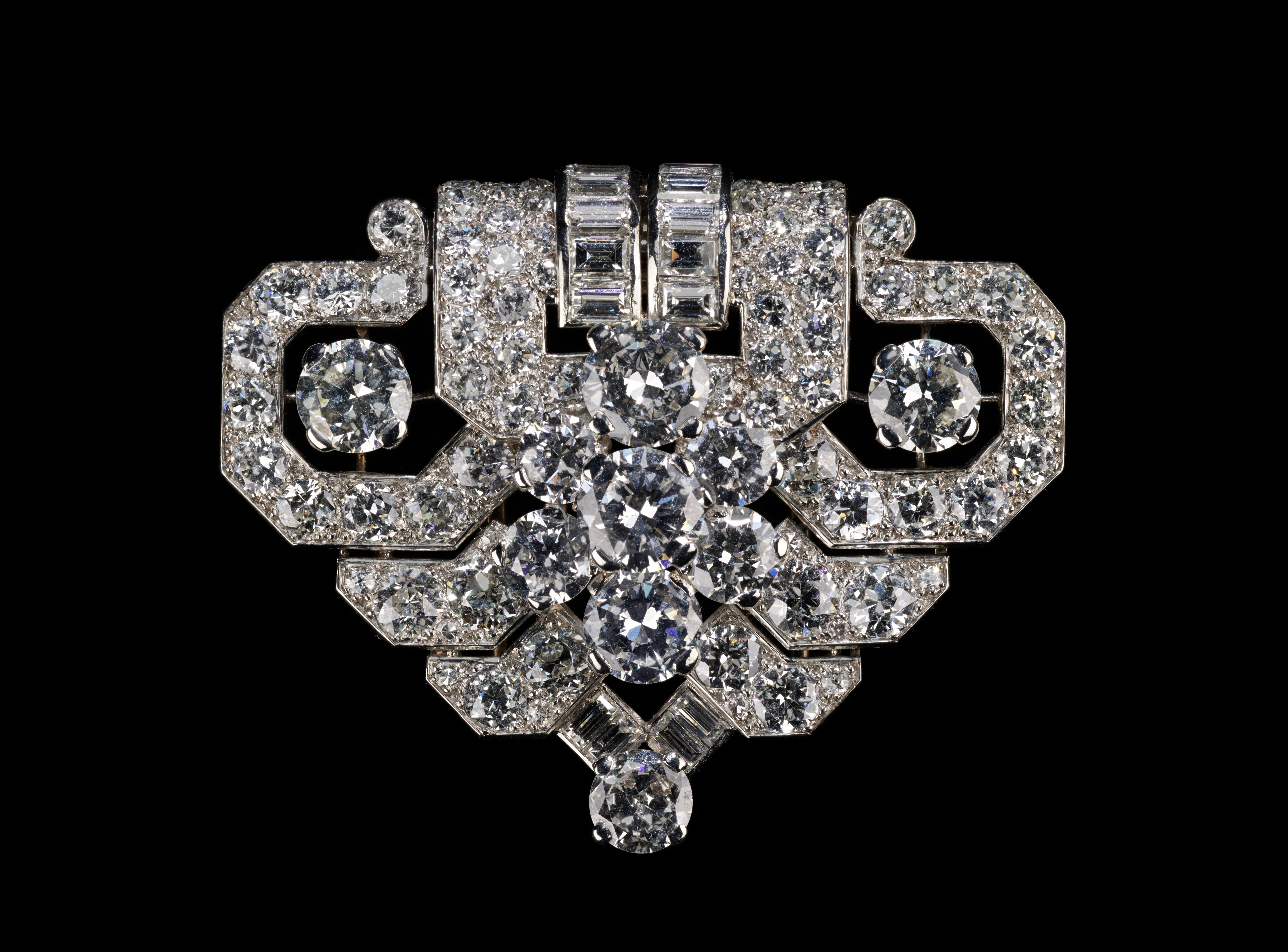 A late art deco Cartier brooch featuring diamonds and platinum