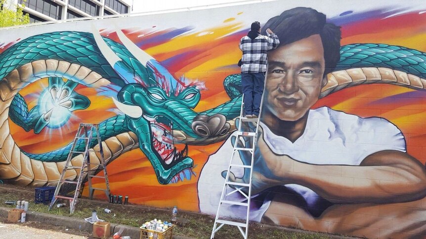 A mural being painted of Jackie Chan in Dickson in Canberra's north.