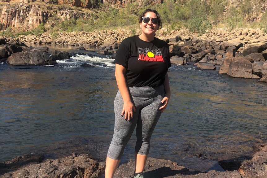 Amy Ramires wearing an always was always will be t-shirt with the Aboriginal flag on it