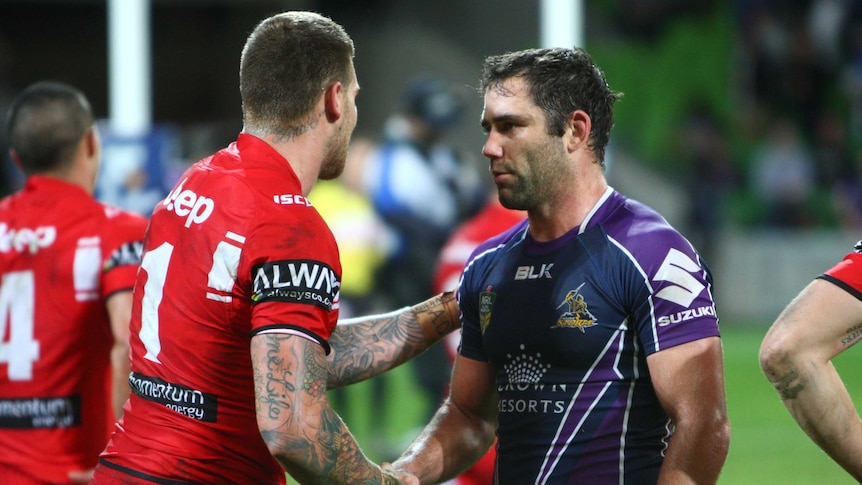 Cameron Smith shakes Josh Dugan's hand after late win