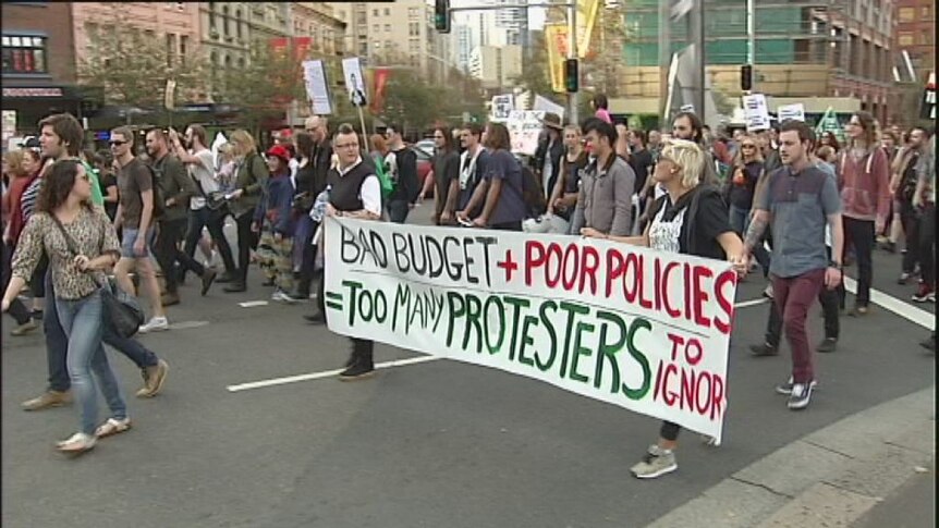Thousands march against budget cuts