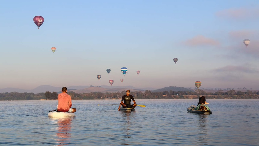 Paddleboards and hot air balloons, Lake Burley Griffin, Canberra.