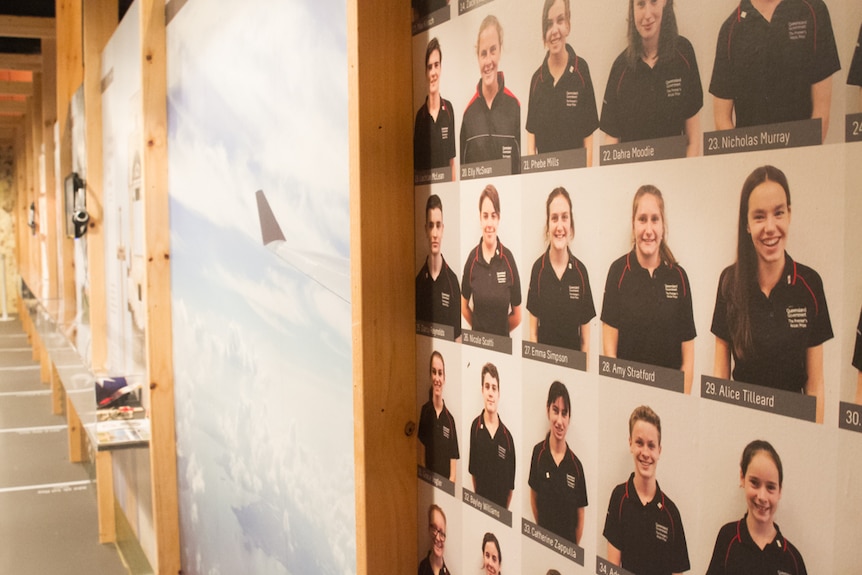 Photos of the students who visited Anzac Cove line the trench walls.