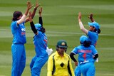 India celebrates the wicket of Grace Harris