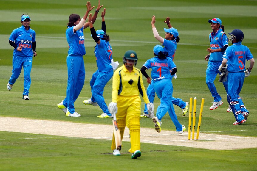 India celebrates the wicket of Grace Harris