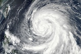 A satellite image shows Typhoon Megi in the western Pacific