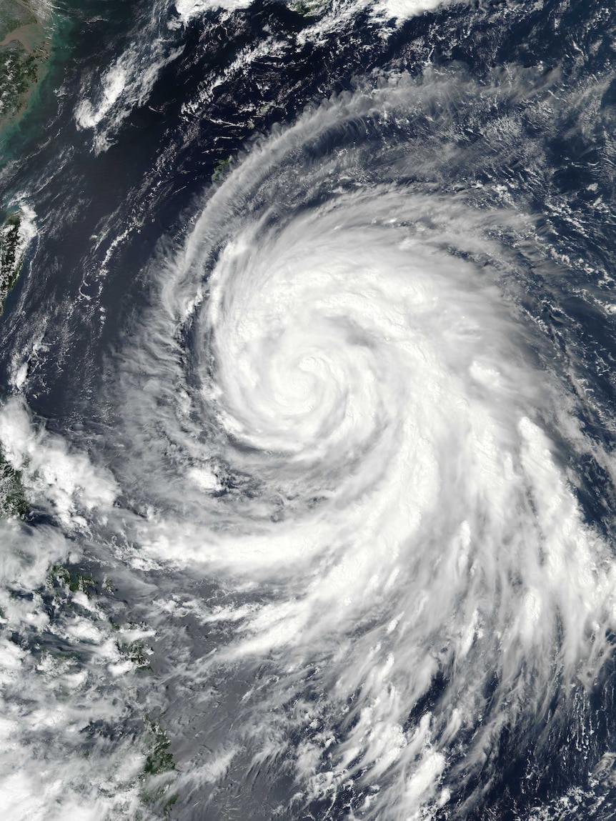 A satellite image shows Typhoon Megi in the western Pacific