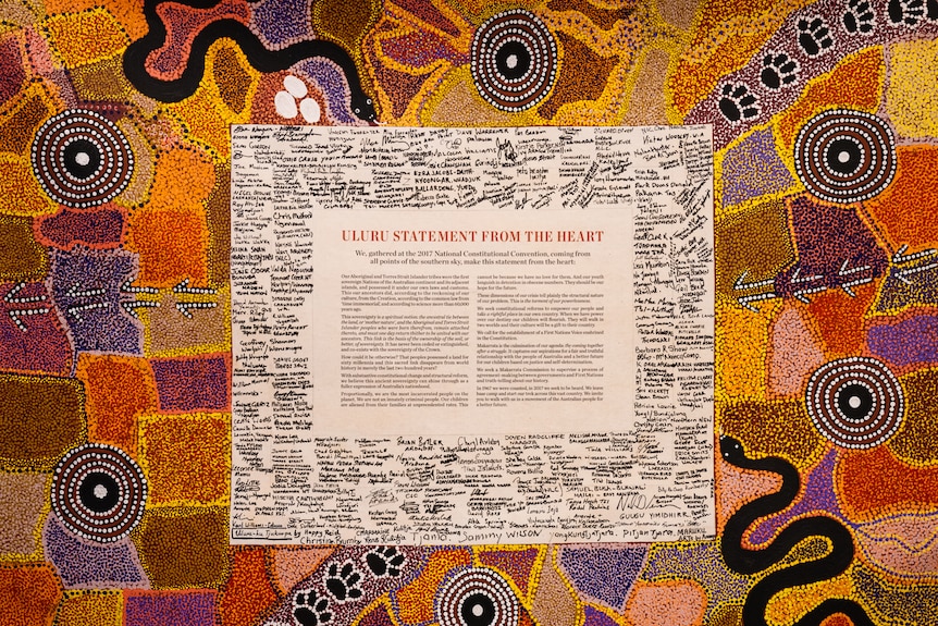 The Uluru statement from the heart surrounded by signatures. 