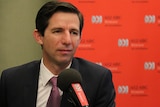 Federal Education Minister Simon Birmingham in the 612 ABC Brisbane studio