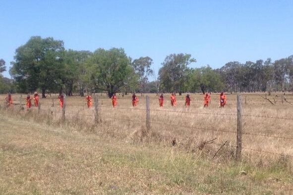 State Emergency Service crews help police search bushland at Port Curtis
