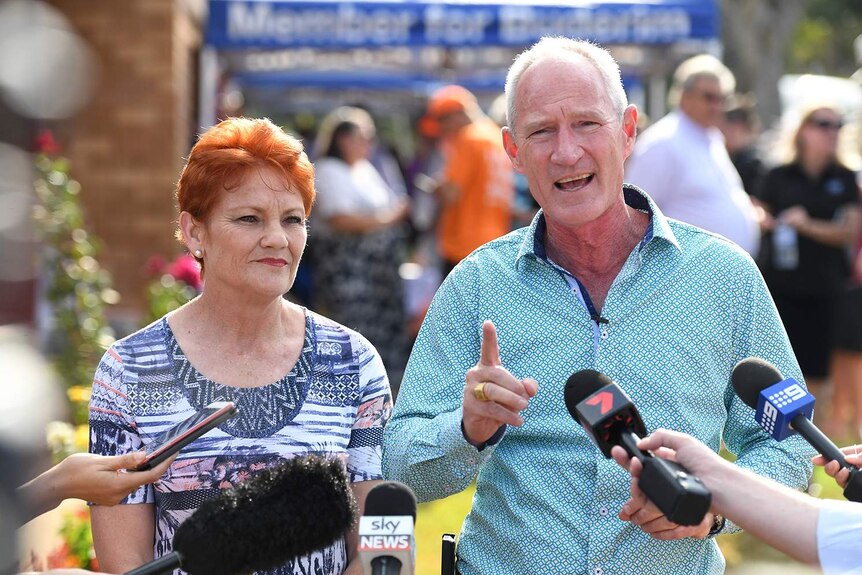 One Nation Senator Pauline Hanson and her Queensland party leader Steve Dickson speak to the media.