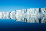 An ice shelf reflecting off the water.