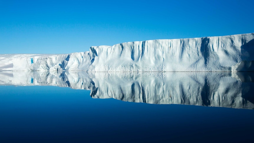 An ice shelf reflecting off the water.