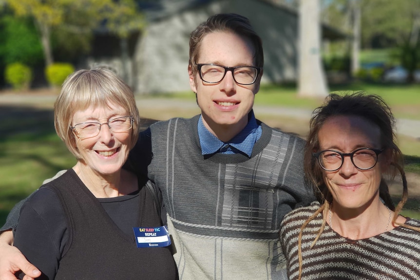 Wilson Hoyle posing for a photo with his mother (r) and grandmother (l)