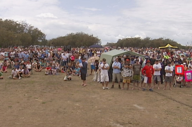 Protesters gather at a park on the Spit, close to where the cruise ship terminal is planned.