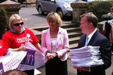 Opposition Leader Will Hodgman was presented with the petition by health unions.