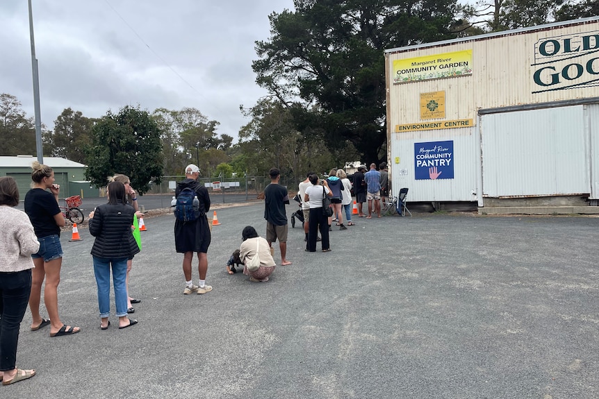 People lining up for the cheap groceries at the community pantry