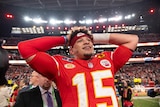 Patrick Mahomes puts his hands on his head after winning SUper Bowl LVIII.