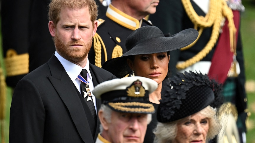 Meghan has tears as Prince Harry, King Charles look sad. 