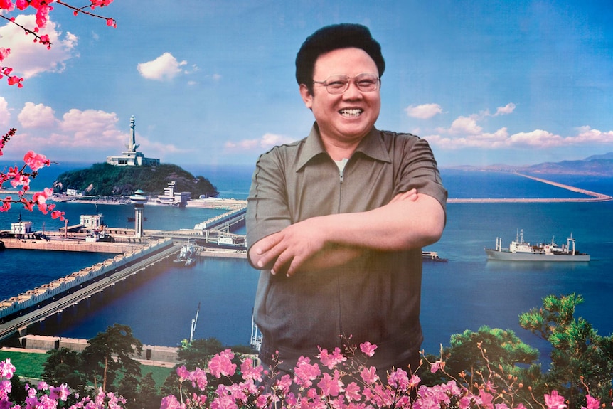 A portrait of Kim Jong-il.