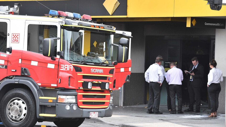 Emergency services crews and investigators at scene of Springvale bank fire