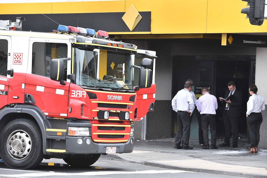 Emergency services crews and investigators at scene of Springvale bank fire