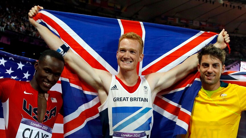 Greg Rutherford celebrates after winning gold in the men's long jump at the London Olympic Games.