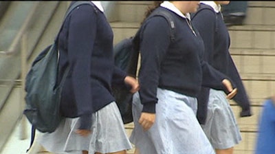 A new report has found the teenage years are critical in predicting obesity in adults. (File photo)