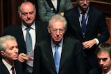 Former European Commissioner Mario Monti (C) arrives at the senate in Rome