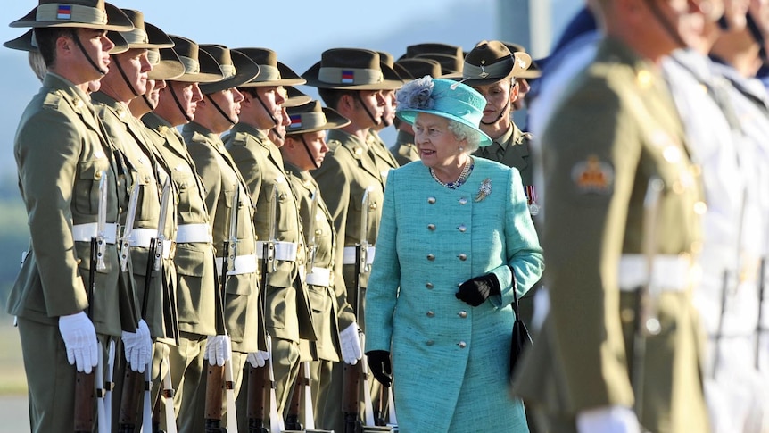 Queen Elizabeth inspects the guard of honour on her arrival in Canberra on October 19, 2011.