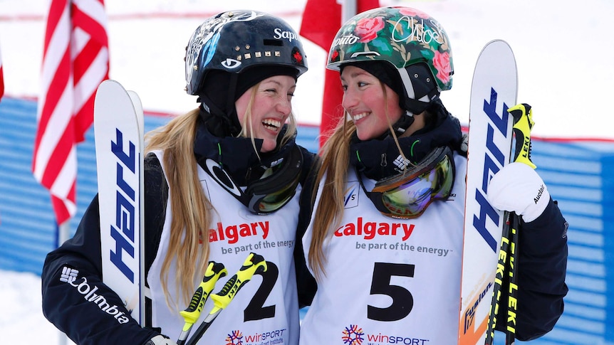 Women's moguls skiers Justine (L) and Chloe Dufour-Lapointe of Canada.