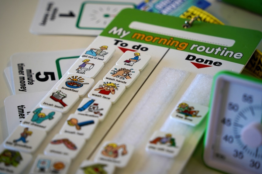 A close up of a colourful board with illustrations printed on stickers