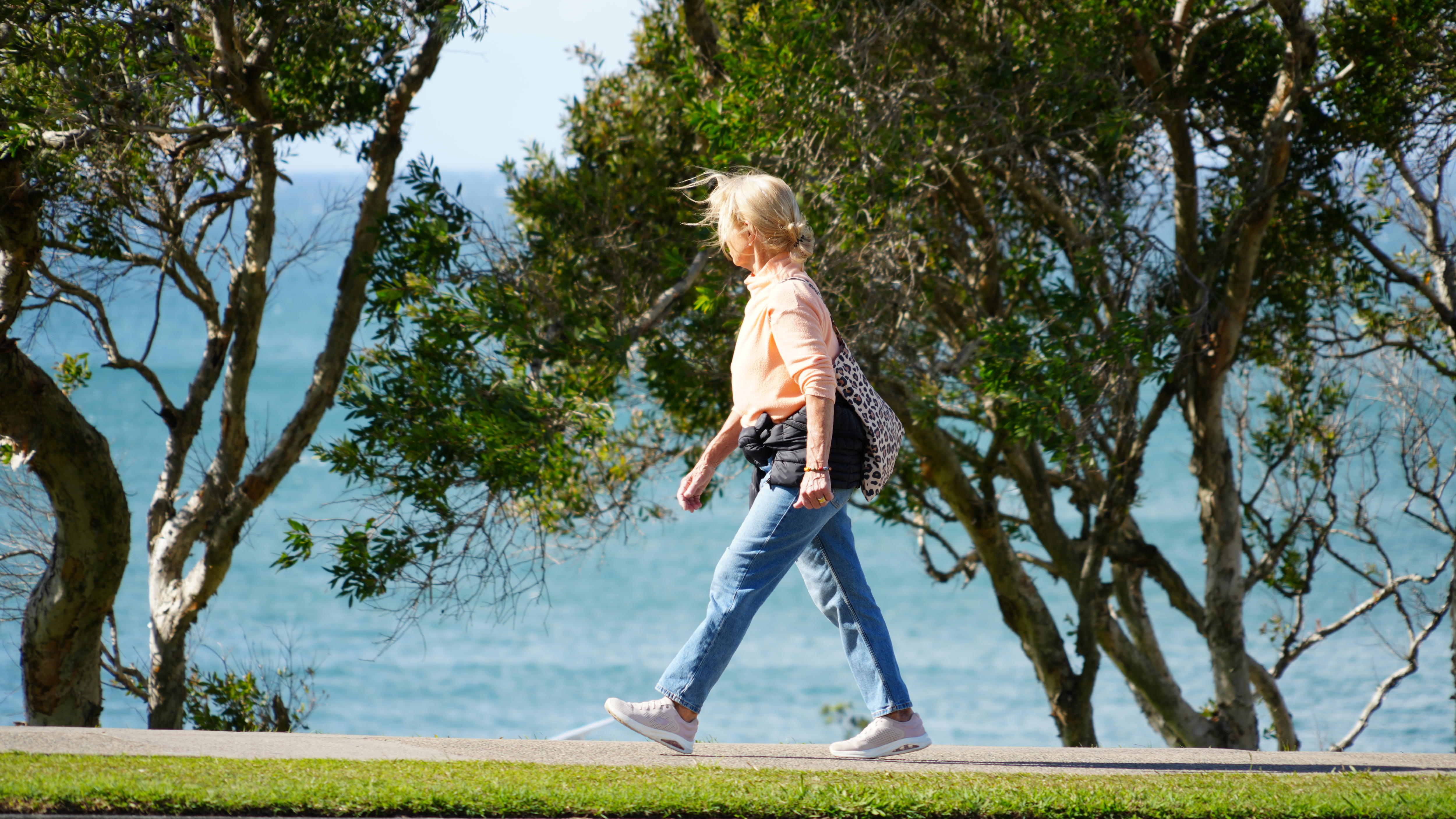 Woman looking around with windy hair