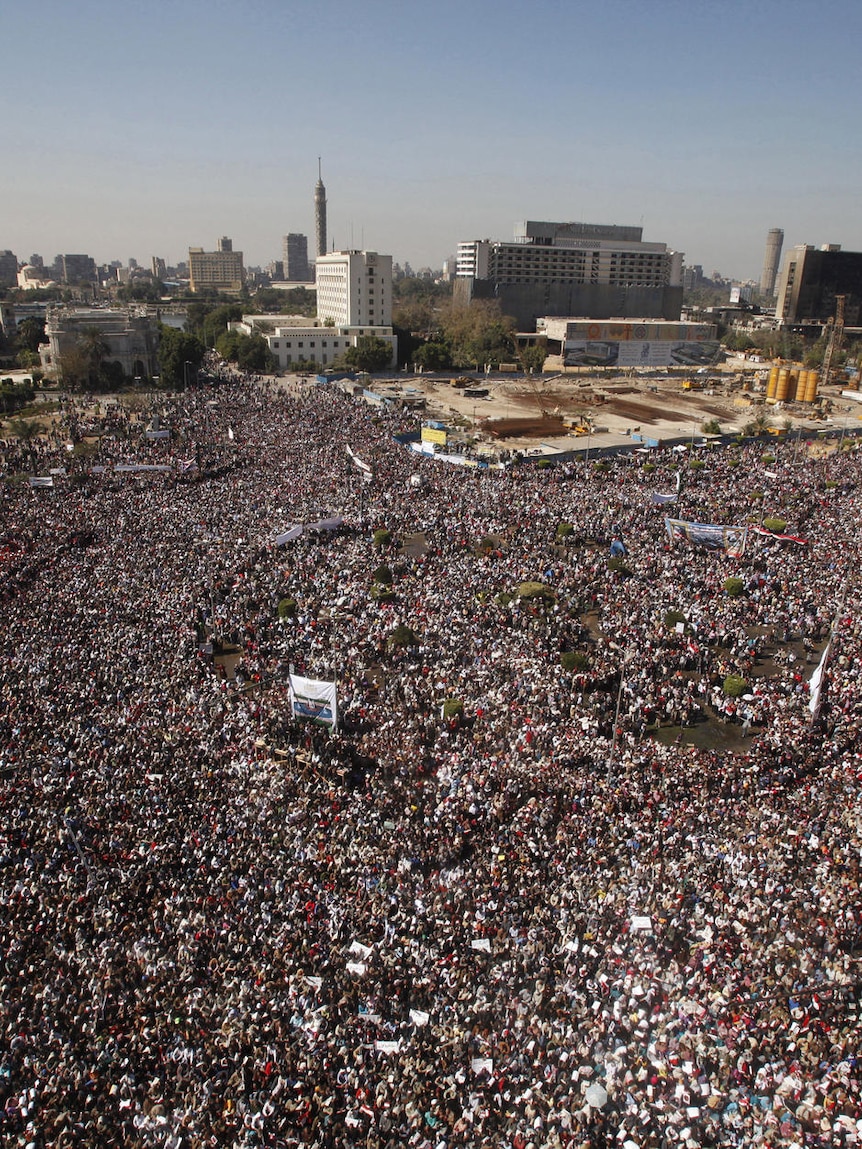 Egyptian pro-democracy supporters gather in Tahrir Square