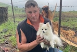 Pom Pom dog with owner Scott McKinnon